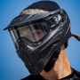 The HK Army HSTL mask worn by a player on the field, showcasing its secure, low-profile fit.