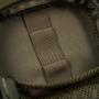 Items stored inside the mesh pocket of the ranger green M-TAC utility panel.