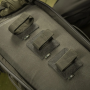 Three Ranger Green M-TAC modular inserts anchoring gear inside a tactical backpack.