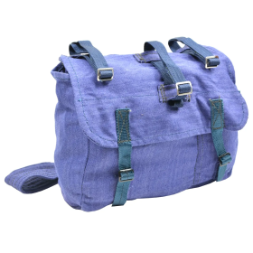 Front view of the used Romanian Army blue canvas bread bag, displaying the main closure flaps and textile straps.