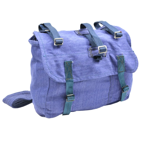 Front view of the used Romanian Army blue canvas bread bag, displaying the main closure flaps and textile straps.
