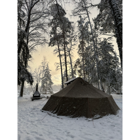 Swedish army squad tent pitched in deep winter snow