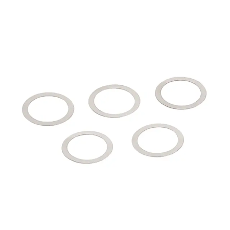 Close-up studio view of the RetroArms INOX pad hop-up chamber washers.