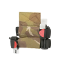 Studio product shot demonstrating the Multicam holder equipped with two medical tourniquets for illustrative setup.