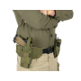 Tactical action setup shot showing the panel mounted securely on an operator's belt with a MOLLE pistol holster attached to it.