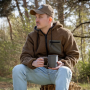 Lifestyle photo of the jacket worn by a model with the sherpa fleece side out.