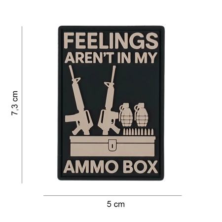 3D PVC moraaliplaastri ("Feelings aren't in my ammo box") stuudiofoto puhtal neutraalsel taustal.