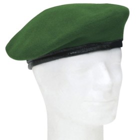 Original German Army Green Beret worn neatly on a mannequin head